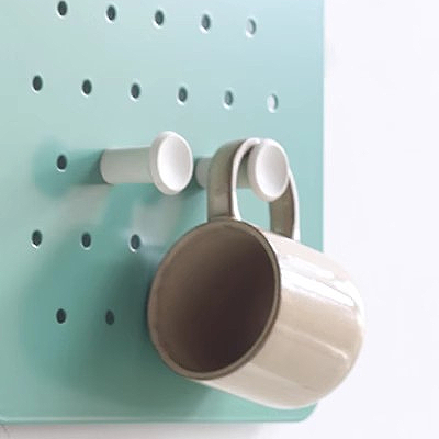 Hanging cup on pegboard plastic hook